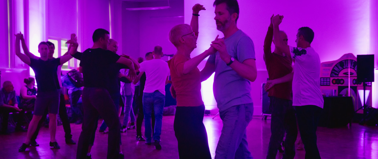 Pink Jukebox participants in motion.