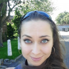 A portrait photo of tutor Arina.